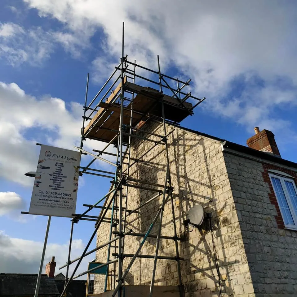 A building with scaffolding on the side of it.